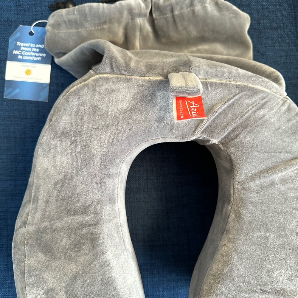 Ariel neck pillow. New in self contained cover.